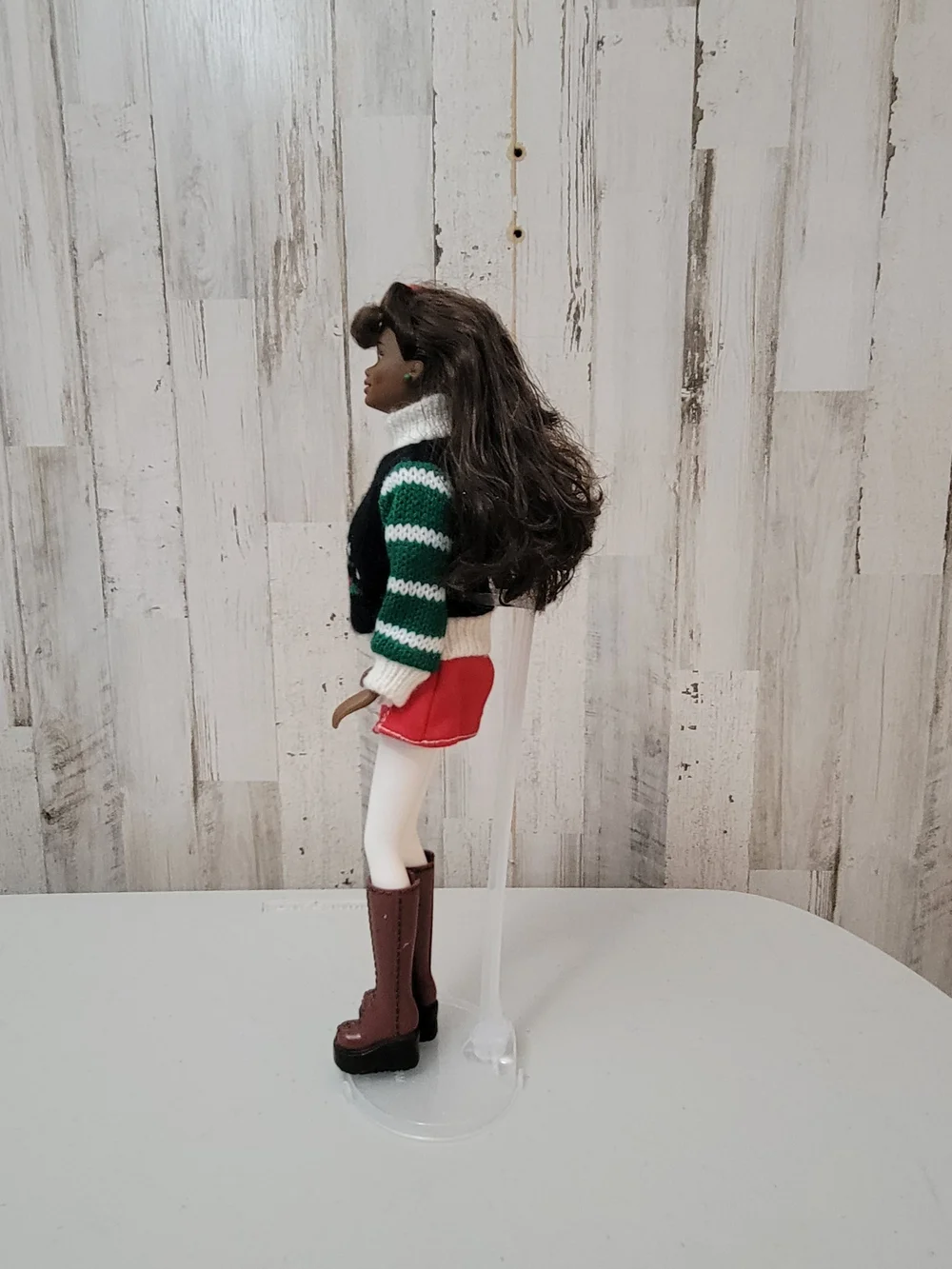 Brunette Doll with Green Stud Earrings and White Turtleneck